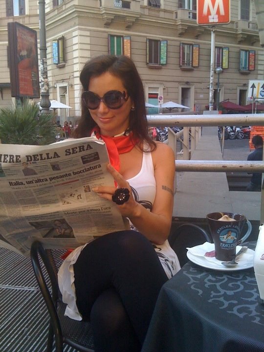 coffee break and newspaper readings in Piazza Vanvitelli at the Vomero quarter  