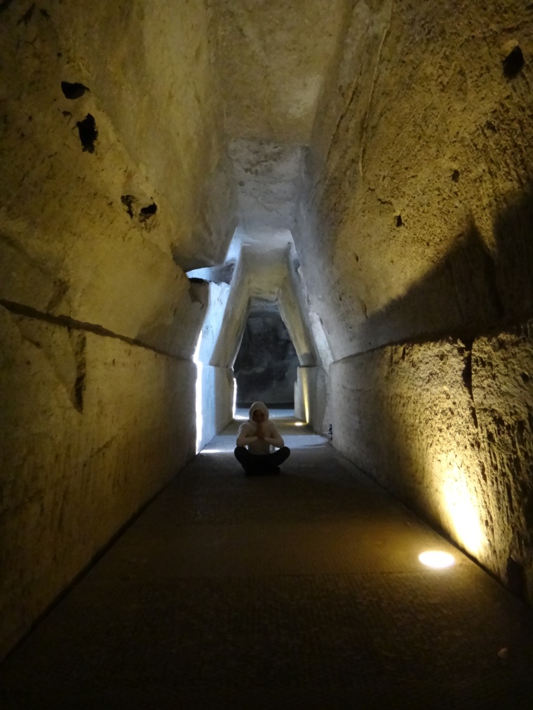 The Sibyl's cave: according to the myth, this was where to find the Cumaean Sibyl; the oracle consulted by Aeneas.  The tufa passage way, trapezoid in section is naturally illuminated by narrow fissures and ends in a vaulted chamber.  The system connects Cumae to lake Averno.  