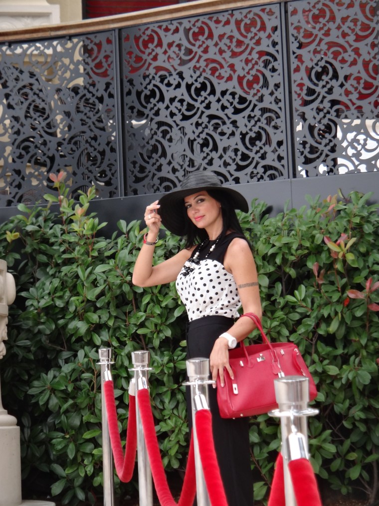 The Birkin bag pictured here in furious red is more flexible than the Kelly and can remain easily open at the top.  The Birkin has two handles when the Kelly has only one handle.