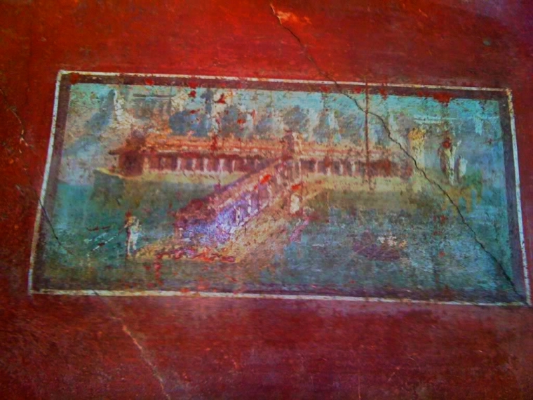 Wealthy residents in Pompeii had often well decorated walls like this one found in the House of The Vettii.