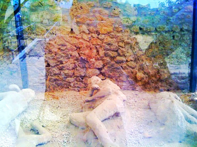 Ash and debris covered Pompeii and bodies were buried by a landslide of thick mud.  People tried to scape but didn't make it, many were killed by the toxic fumes while engaged in everyday tasks.