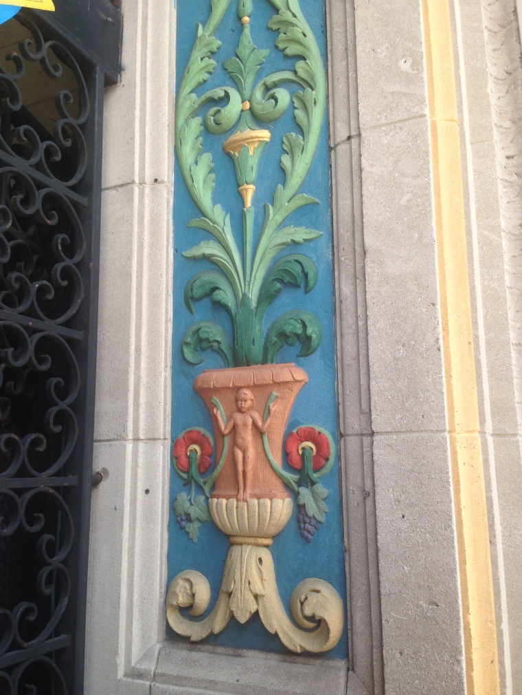 Detail on the entrance of Soya & Pomodoro restaurant.  The Shoreland Arcade Building is part of the National Register of Historic Places 